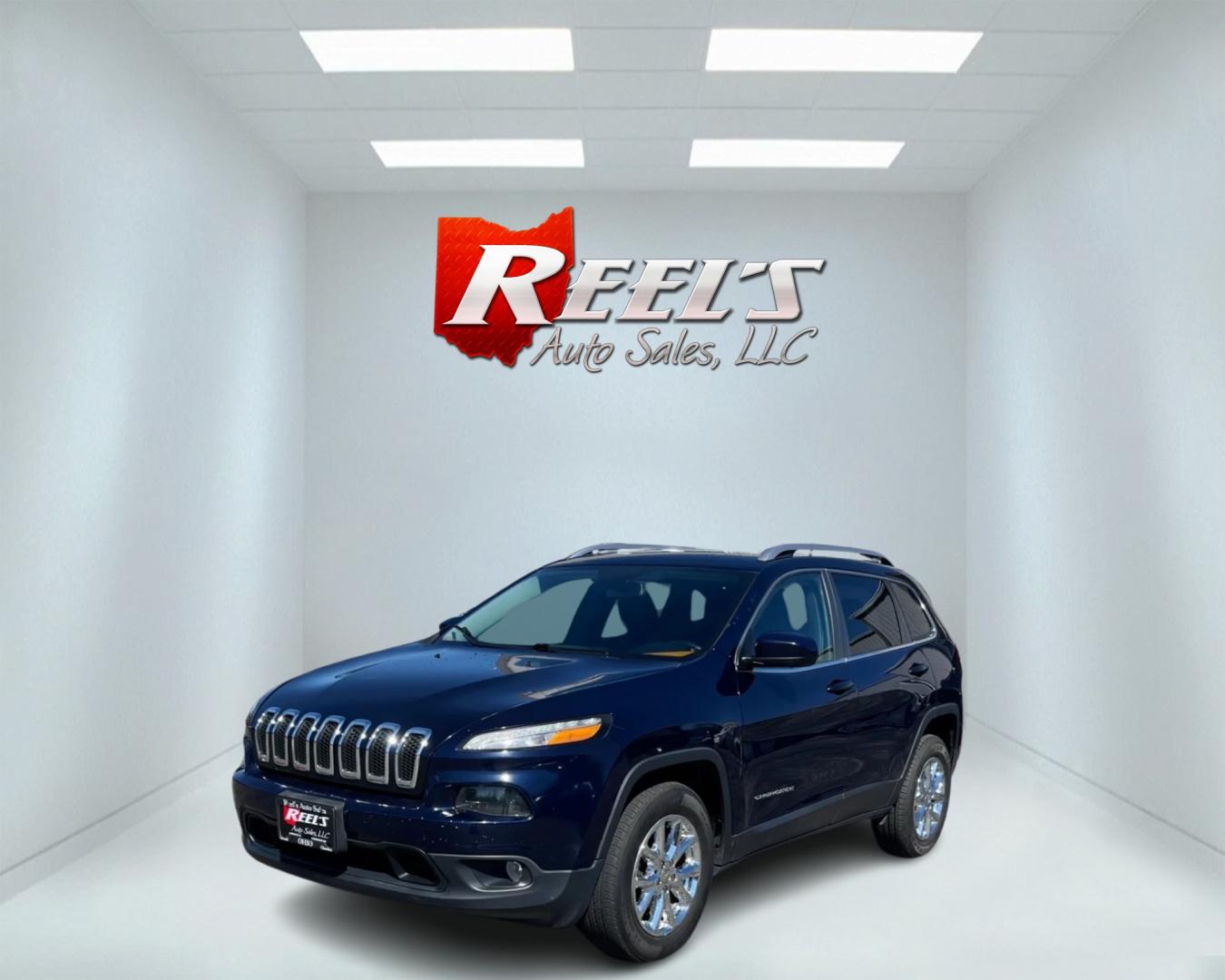 2016 Blue /Black Jeep Cherokee Latitude 4WD (1C4PJMCS1GW) with an 3.2L V6 DOHC 24V engine, 9-Speed Automatic transmission, located at 11115 Chardon Rd. , Chardon, OH, 44024, (440) 214-9705, 41.580246, -81.241943 - Photo#0